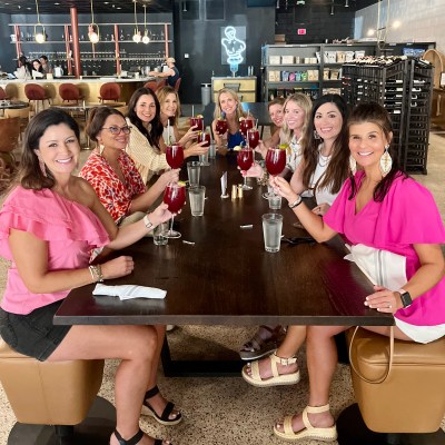 a group of people sitting posing for the camera